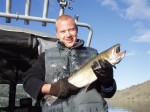 Austin with a nice 7 Lb. bull trout caught by Gary Goldberg.
